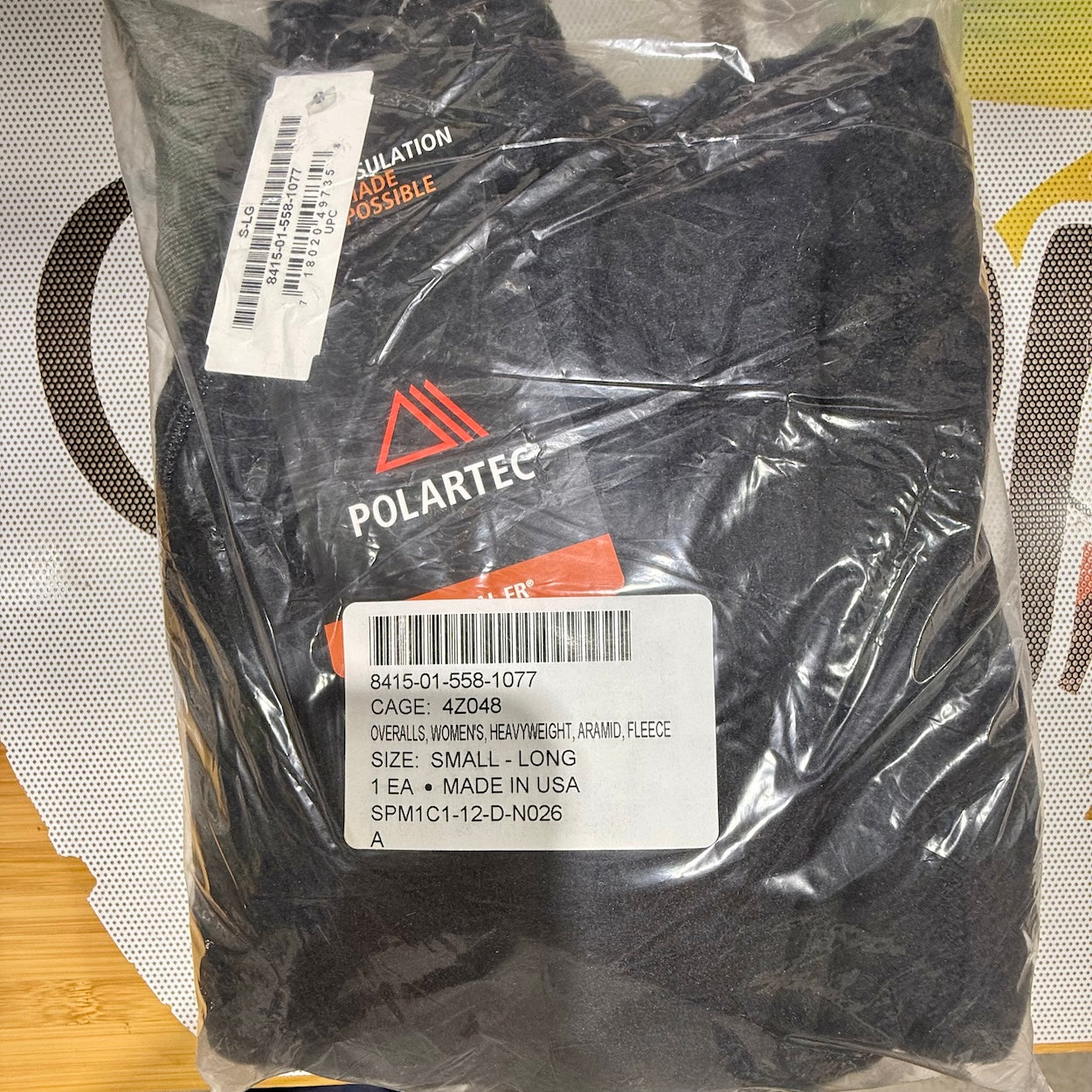 Polar Tec product in clear packaging with labels on a wooden surface